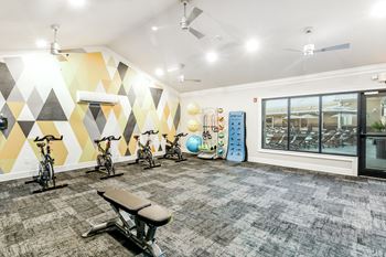 Interactive fitness center at Crossgates Apartment Homes, Starkville, MS 39759